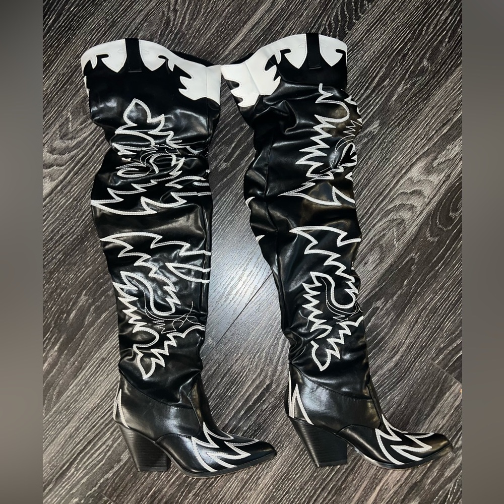 Thigh high cowboy boots